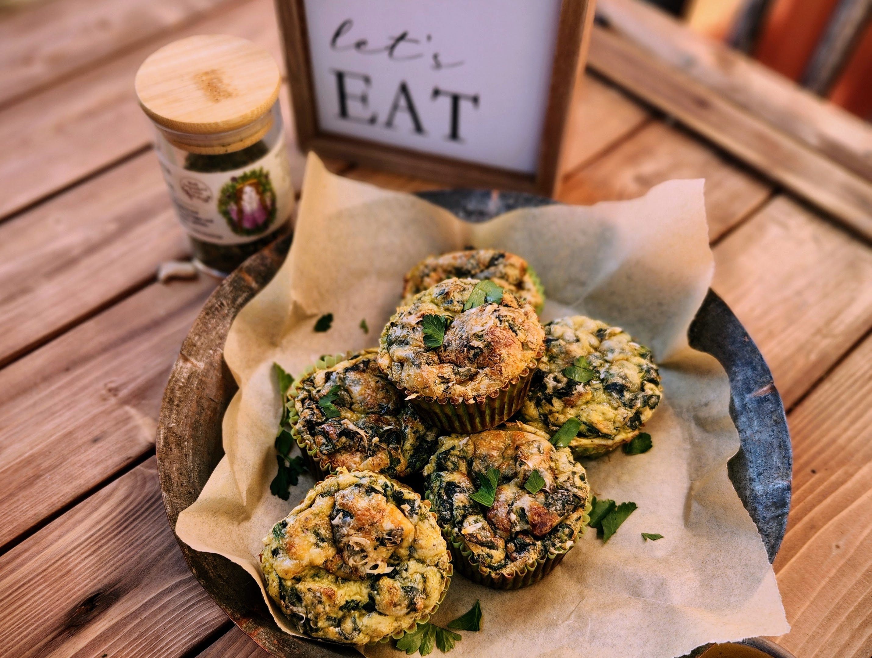 green goddess frittata cups in a copper bowl on wood table